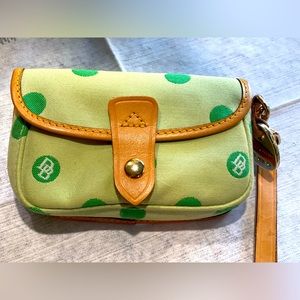 A cute and small original Dooney & Bourke wristlet!